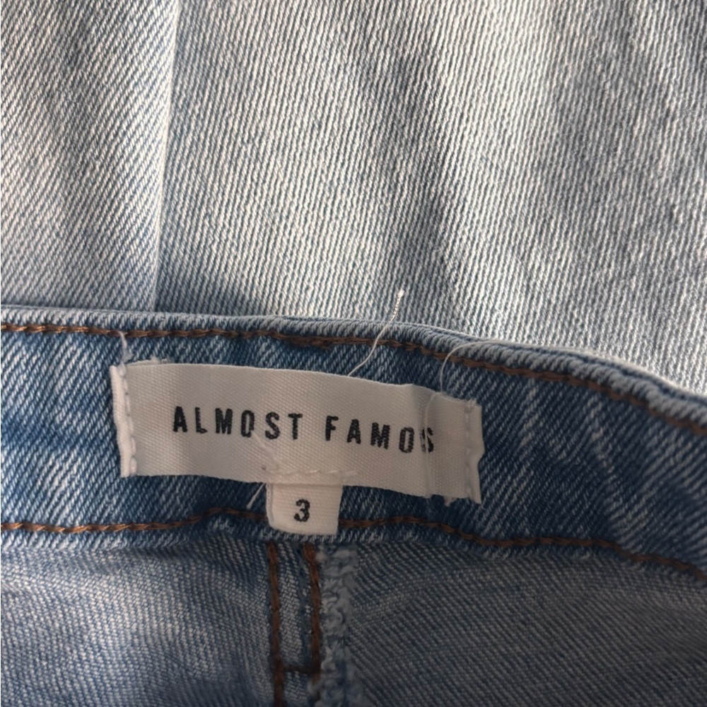 Almost Famous Flare Leg Jeans Size 3 
Multi colored denim. Frayed bottoms. - Picture 5 of 7